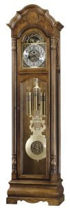 light wood and bronze Howard Miller long case pendulum clock