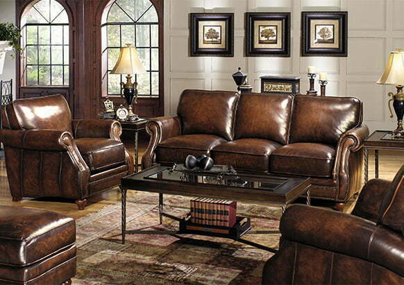 Leather sofa and arm chair with coffee table