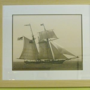 framed sailboat artwork