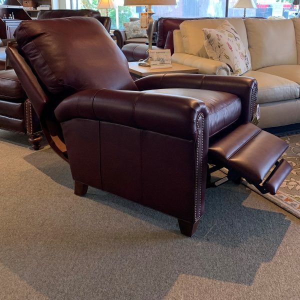 red leather recliner with metal detailing