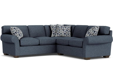 navy blue sectional with 4 pillows