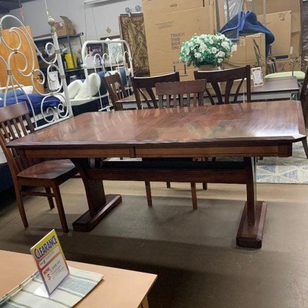 wooden dining table with two wooden chairs