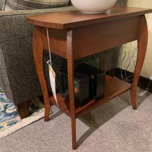 brown rectangular end table. Small shelf at bottom for storage.